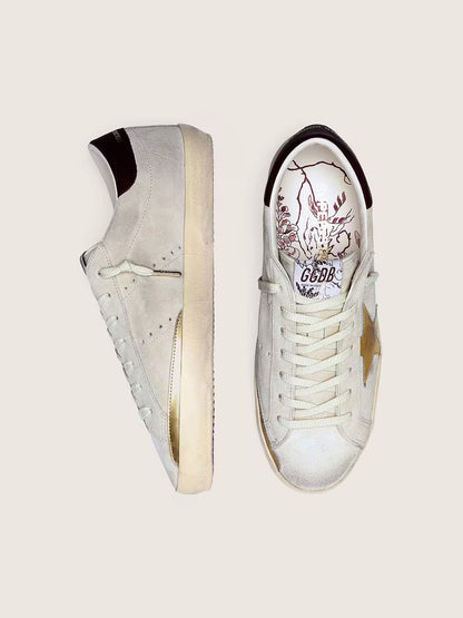 Ivory suede with laminated leather star and leather heel tab