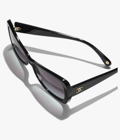 Occhiali da sole Butterfly in acetato nero con lenti grigie sfumate