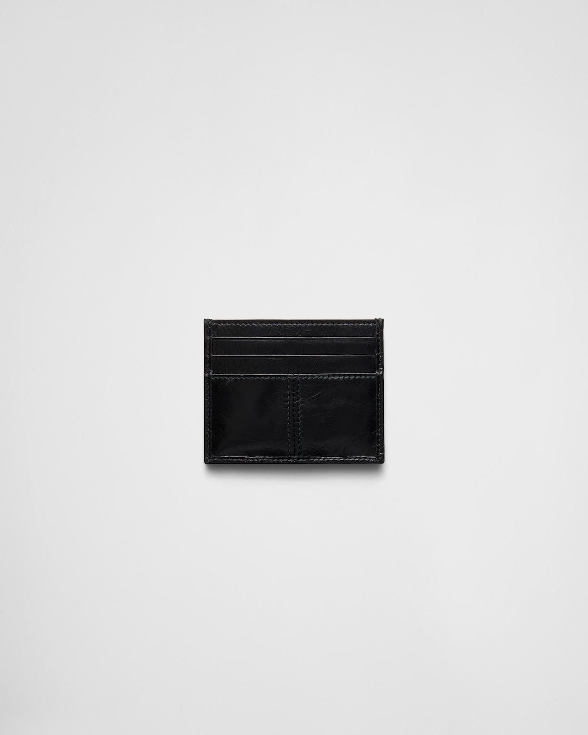 Black leather card holder with triangle logo