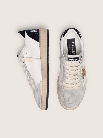 Nappa and suede with glitter star and black heel tab