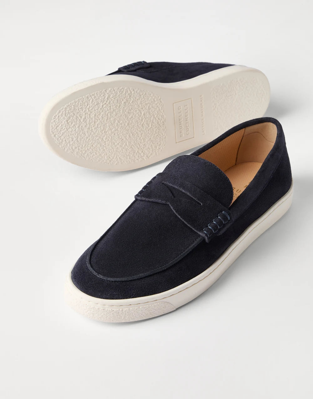 Navy blue suede slip-ons