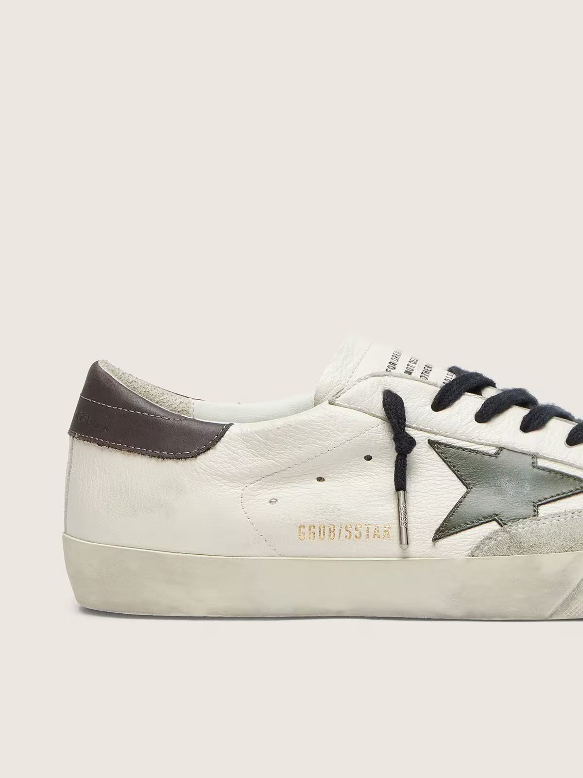 Green leather star nappa with grey leather tag