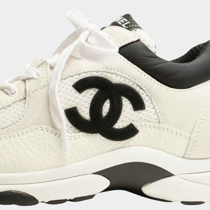 White/black mesh suede sneakers