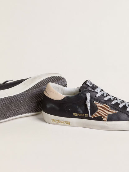 Black nappa leather with zebra-print pony skin star and beige leather heel tab