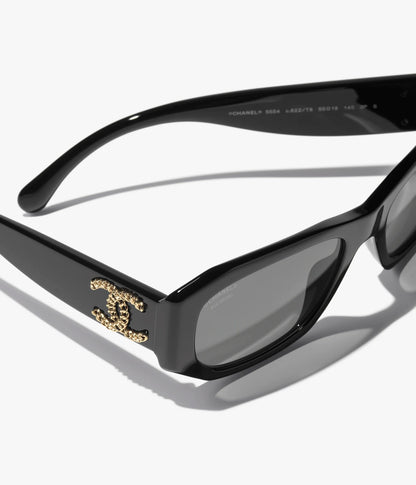 Occhiali da sole rettangolari in acetato con lenti nere e grigie