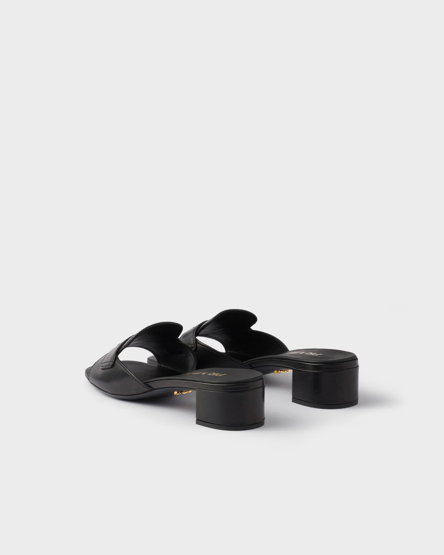 Black leather low-heeled slider sandals