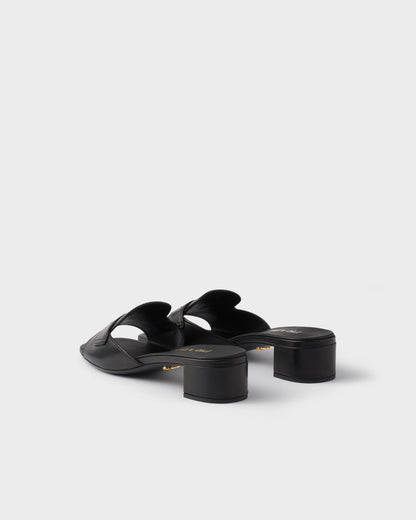 Black leather low-heeled slider sandals
