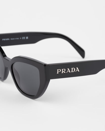 Black cat-eye sunglasses with logo