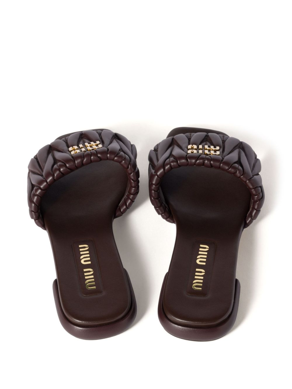 Black quilted leather slippers