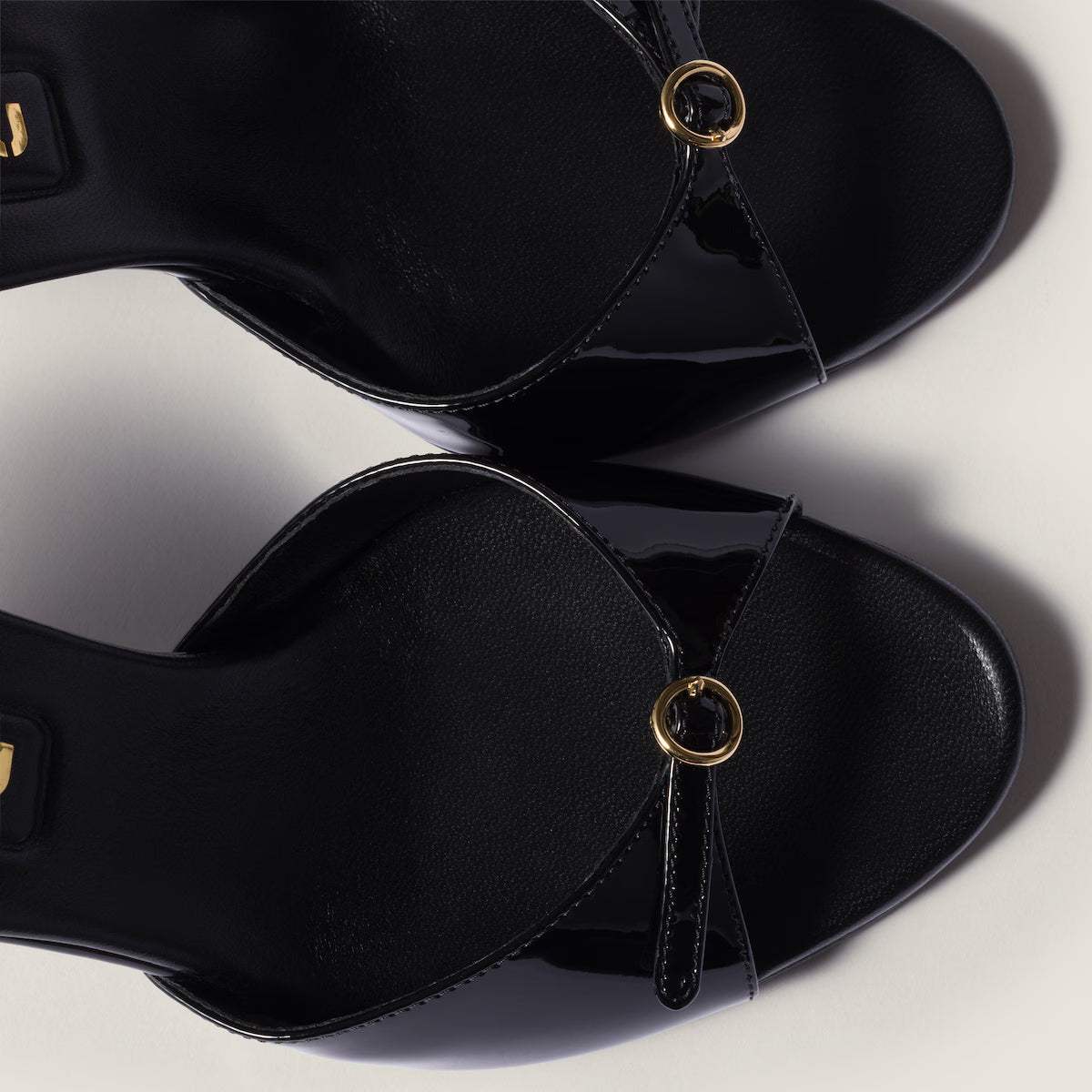 Black patent leather sandals with buckles