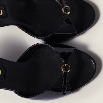 Black patent leather sandals with buckles