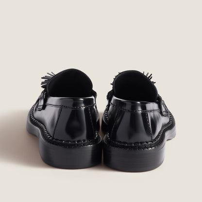 Brushed leather loafers with black tassels