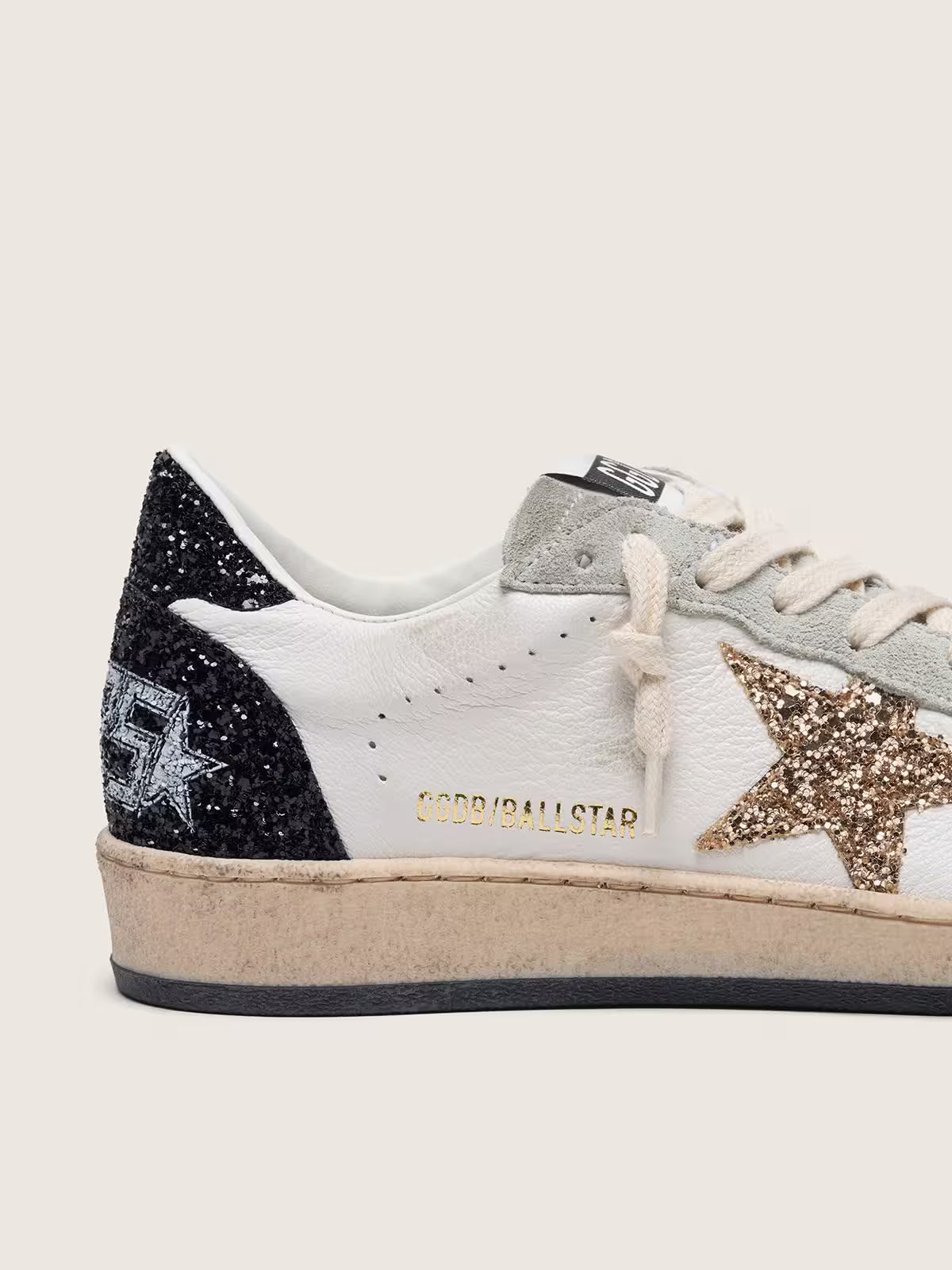 Nappa and suede with glitter star and black heel tab