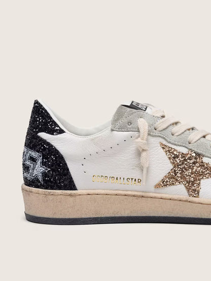 Nappa and suede with glitter star and black heel tab