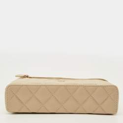 Vanity with shiny beige calfskin sleeve and gilded metal details
