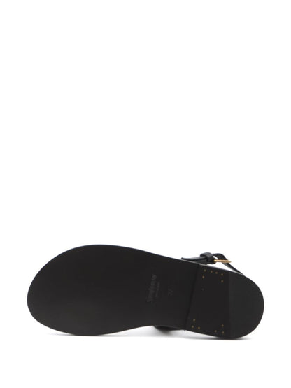 Cassandre buckled slingback sandals in black leather