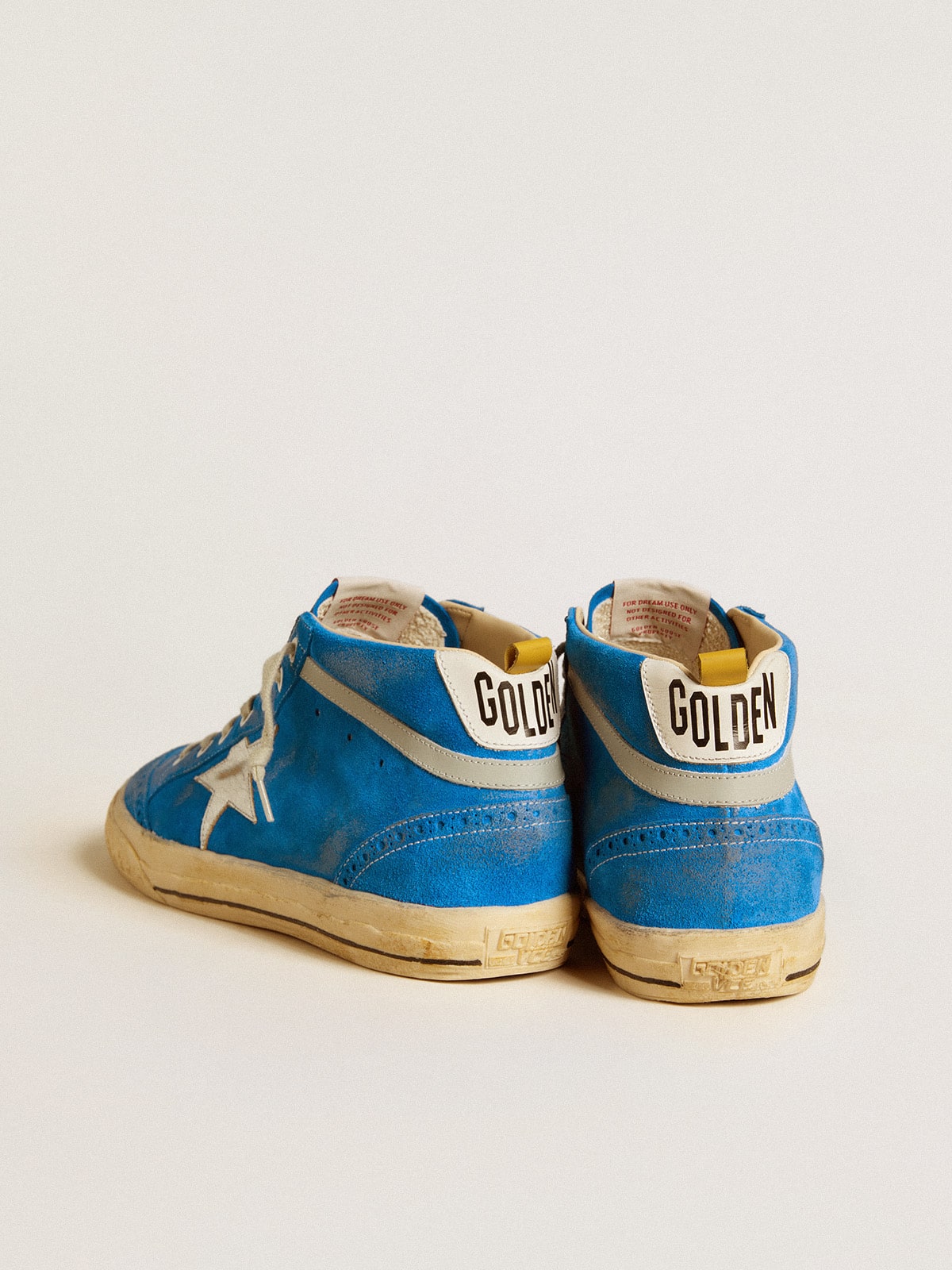 Suede con stella in pelle laminata e talloncino in pelle