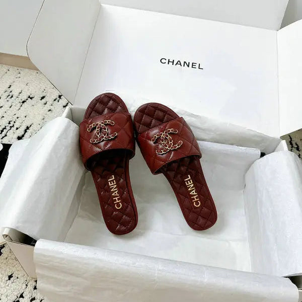 Burgundy quilted leather slides with interwoven C logo