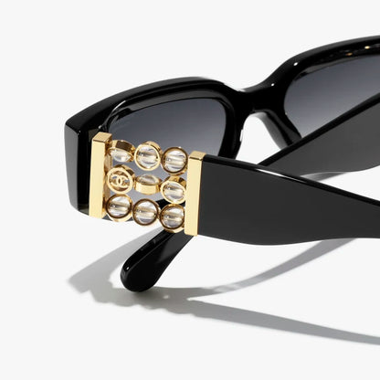 Occhiali ovali da sole Nero