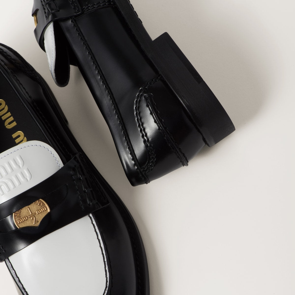 Black/white leather loafers