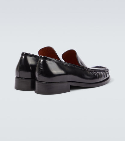 Black leather loafers