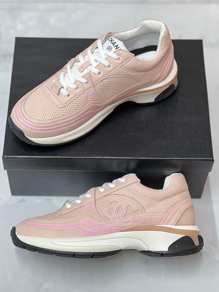 Sneakers in pelle scamosciata a rete rosa