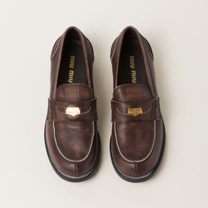 Brown vintage-effect leather loafers