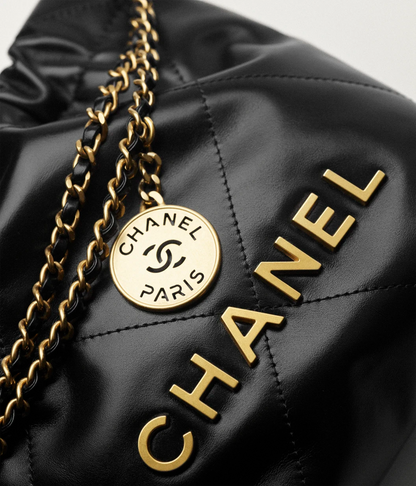 Mini 22 bag in shiny black calfskin and gold-tone metal