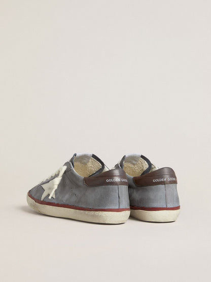 Light blue nubuck leather LTD with white leather star and brown leather heel tab