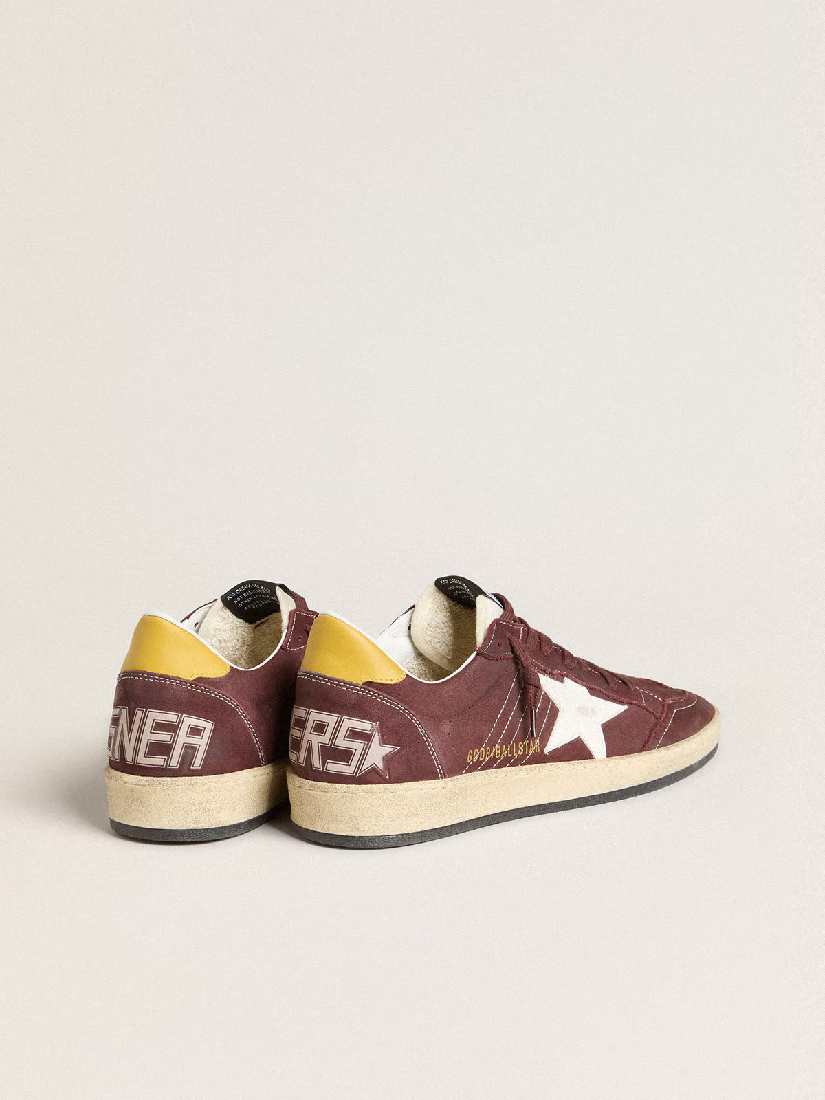 Chocolate nubuck with star and leather tag
