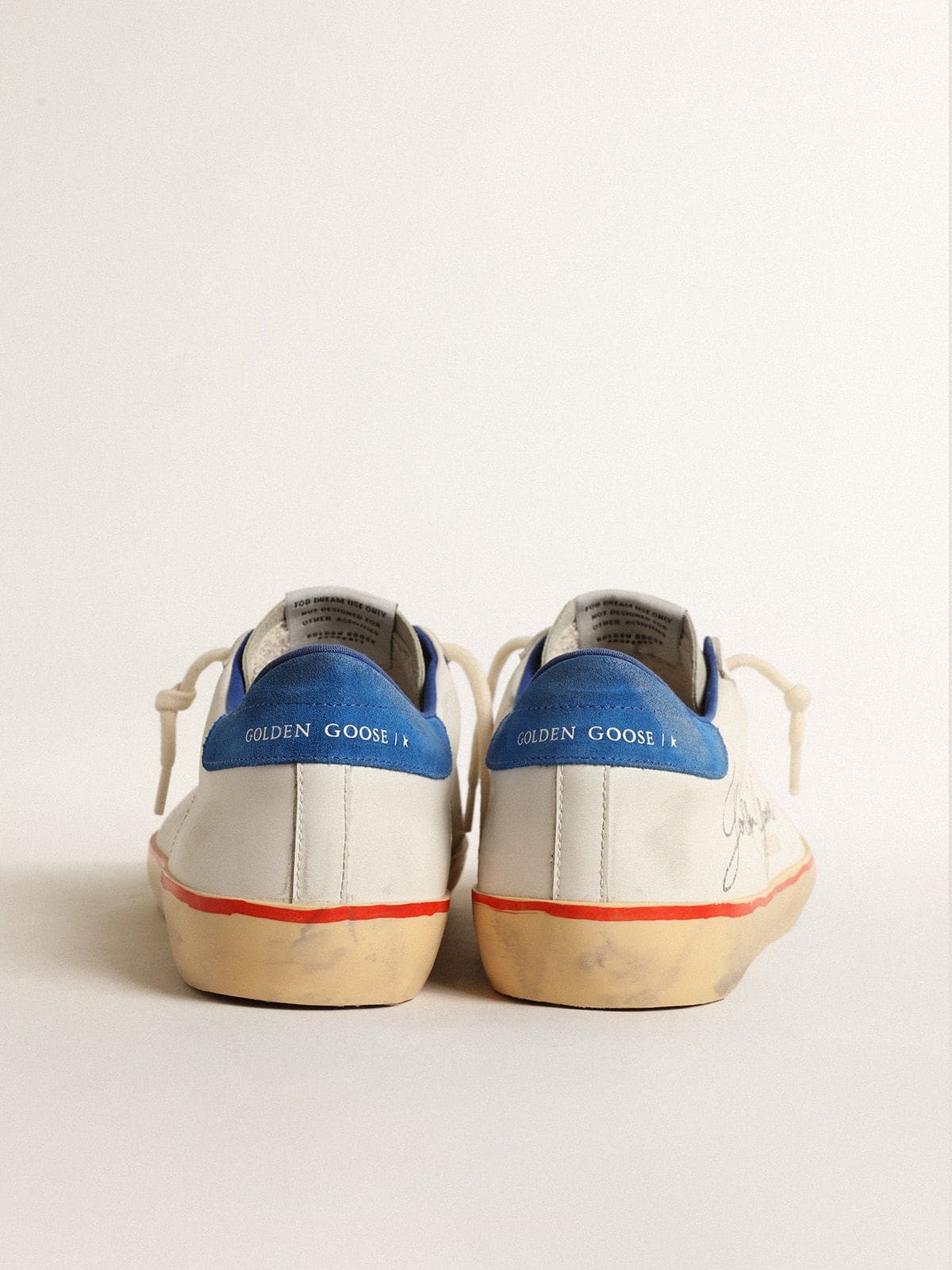 Stella traforata e talloncino in suede blu