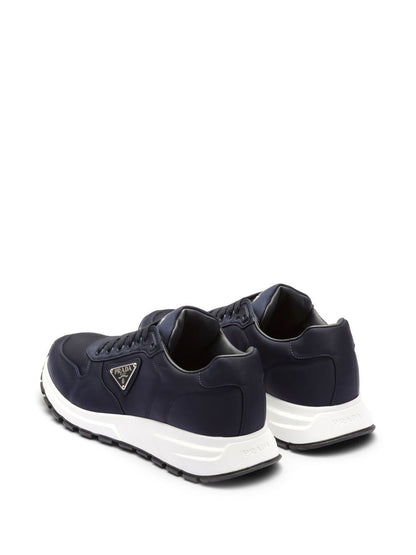 Sneakers basse con logo stampato blu navy