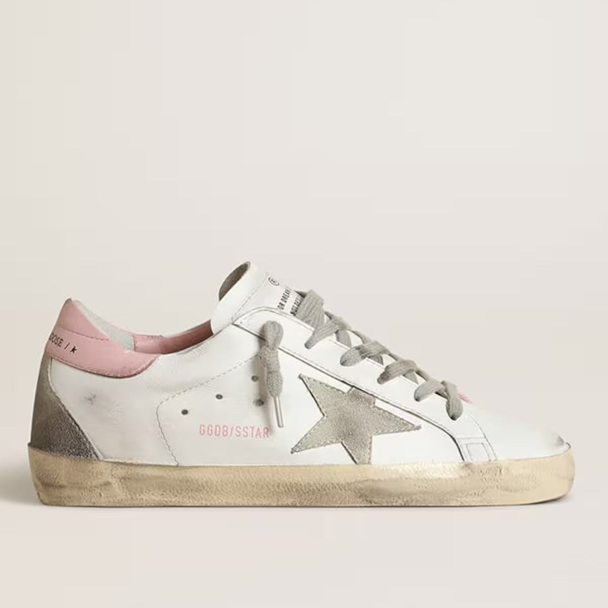 Stella in suede grigio e talloncino in pelle rosa