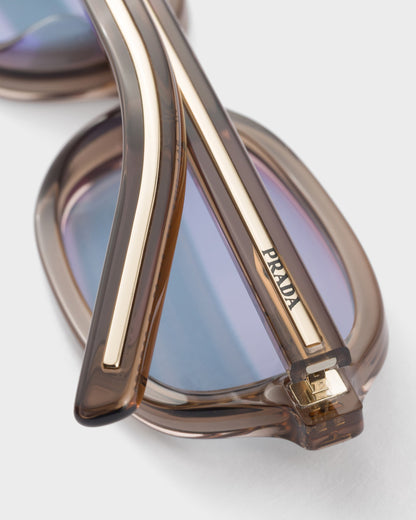 Sonnenbrille mit ikonischer Metallplakette und Cristal Ultraviolet Gläsern