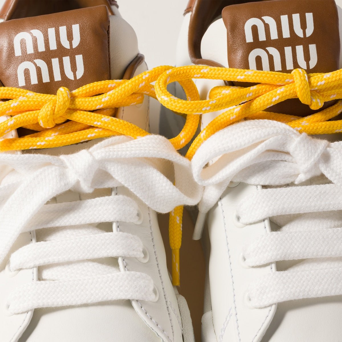 White/brown leather sneakers