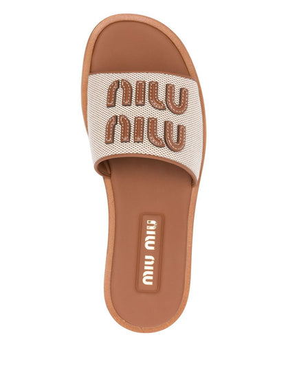 Camel brown sandals with appliqué logo