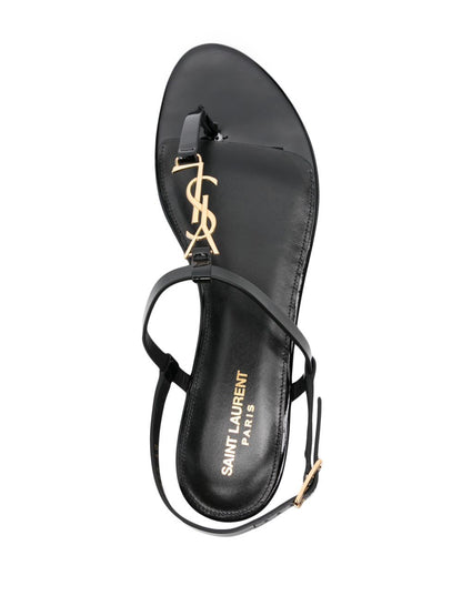 Black leather Cassandra logo plaque sandals