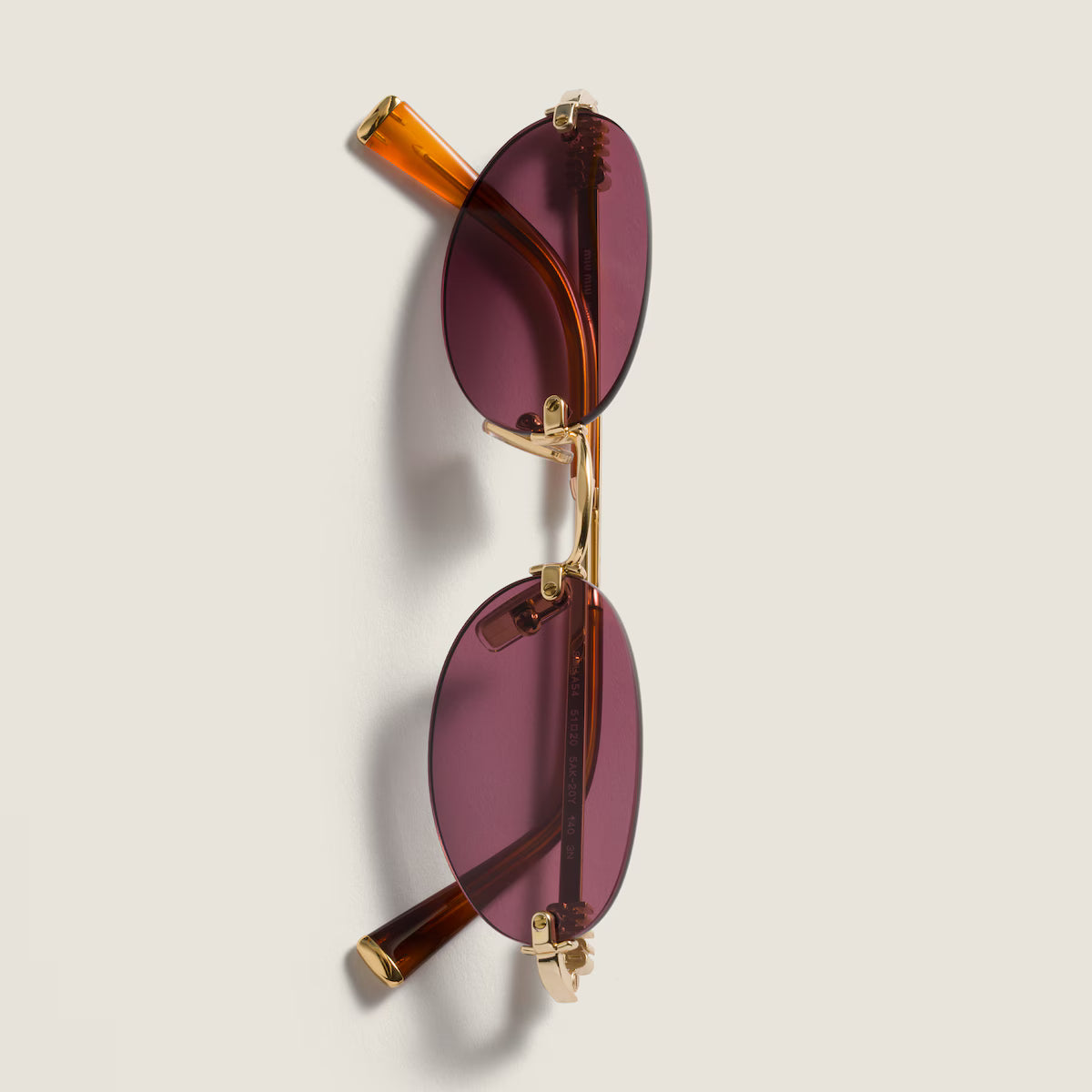 Ruby rimless oval lens sunglasses