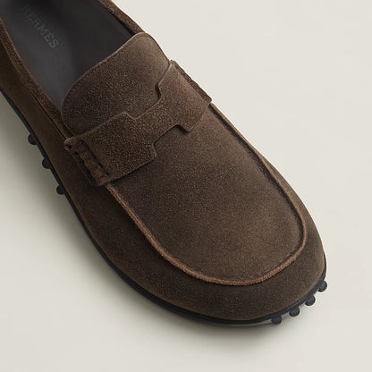Brown suede loafers with H buckle