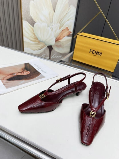 Burgundy leather kitten heel pumps with gold FF buckles