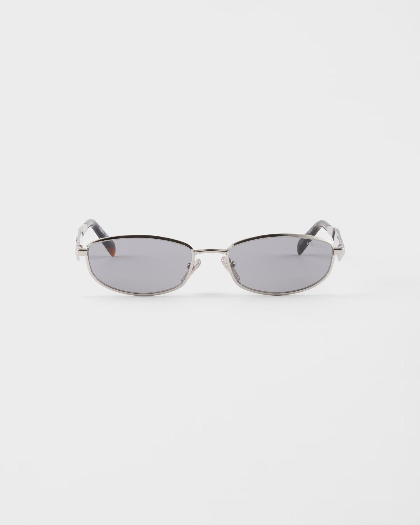 Silver acetate oval sunglasses with gray lenses
