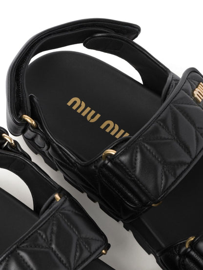 Black quilted leather sandals