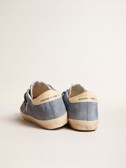 Light blue suede with star and beige leather heel tab
