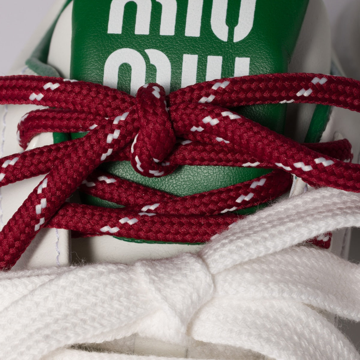 White/green leather sneakers