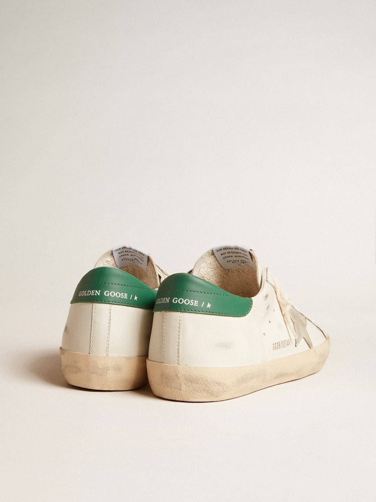 White leather with ice-grey suede star and green leather heel tab