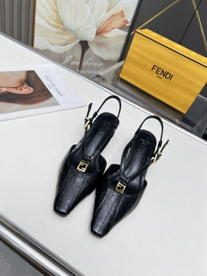 Black leather kitten heel pumps with gold FF buckles