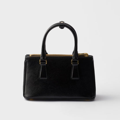 Mini Galleria bag in black patent Saffiano leather