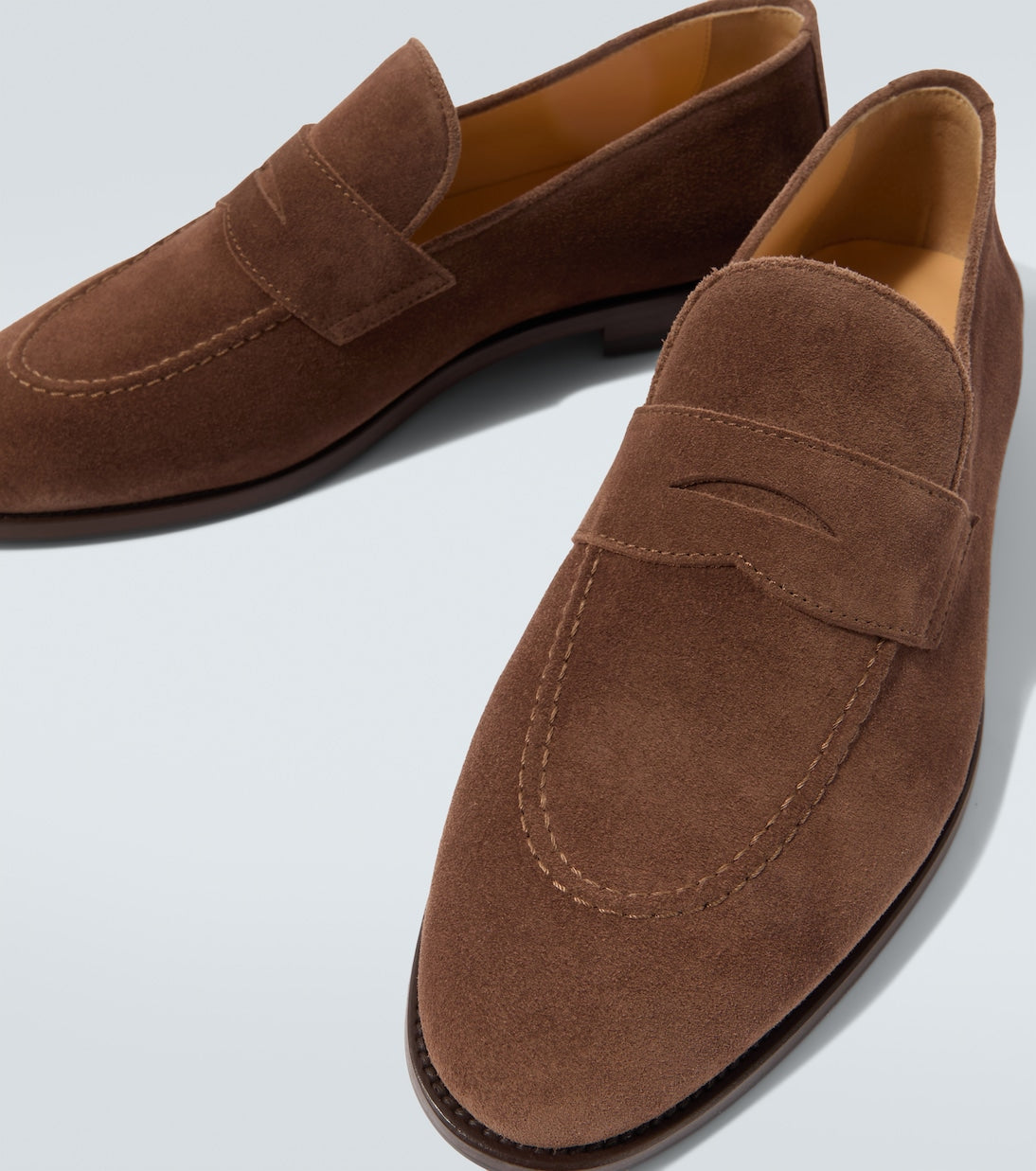 Brown suede penny loafers