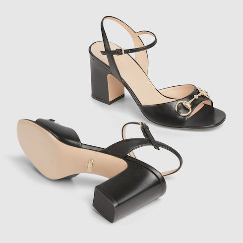 Women's black leather heeled sandal with snaffle