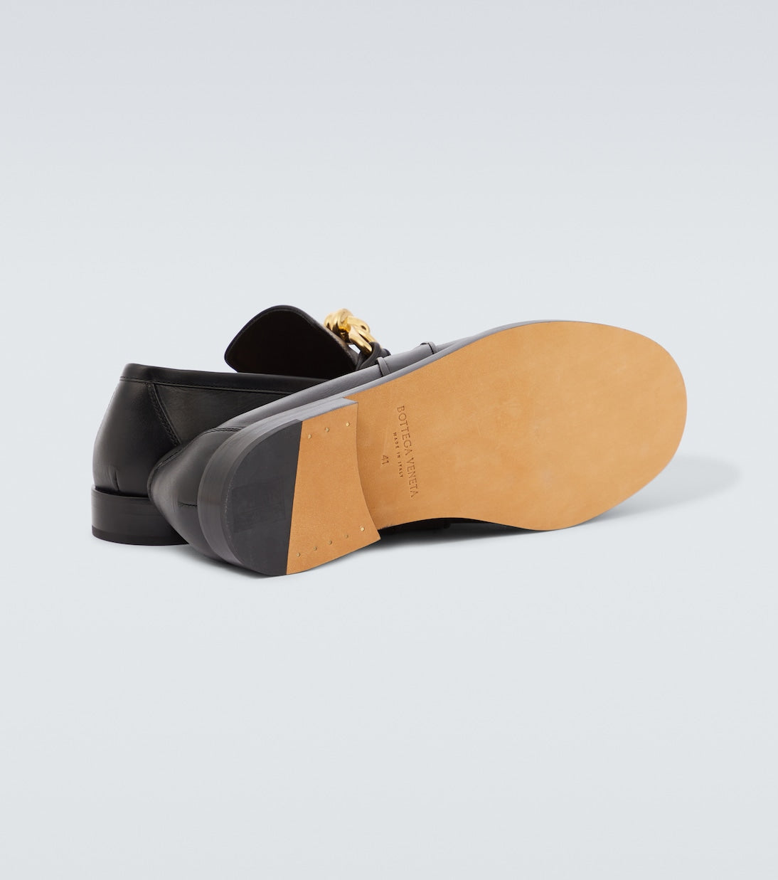 Astaire Knot Loafers in black leather with gold buckle